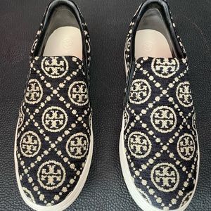 Tory Burch monogram sneakers, these are slip on style.